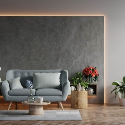 living-room-loft-industrial-style-with-blue-sofa-empty-concrete-wall-3d-rendering-1000x1000